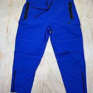 NEW Nike Tech Woven Royal Blue Trousers Tapered Stretch Pants 2XL HM8241-480